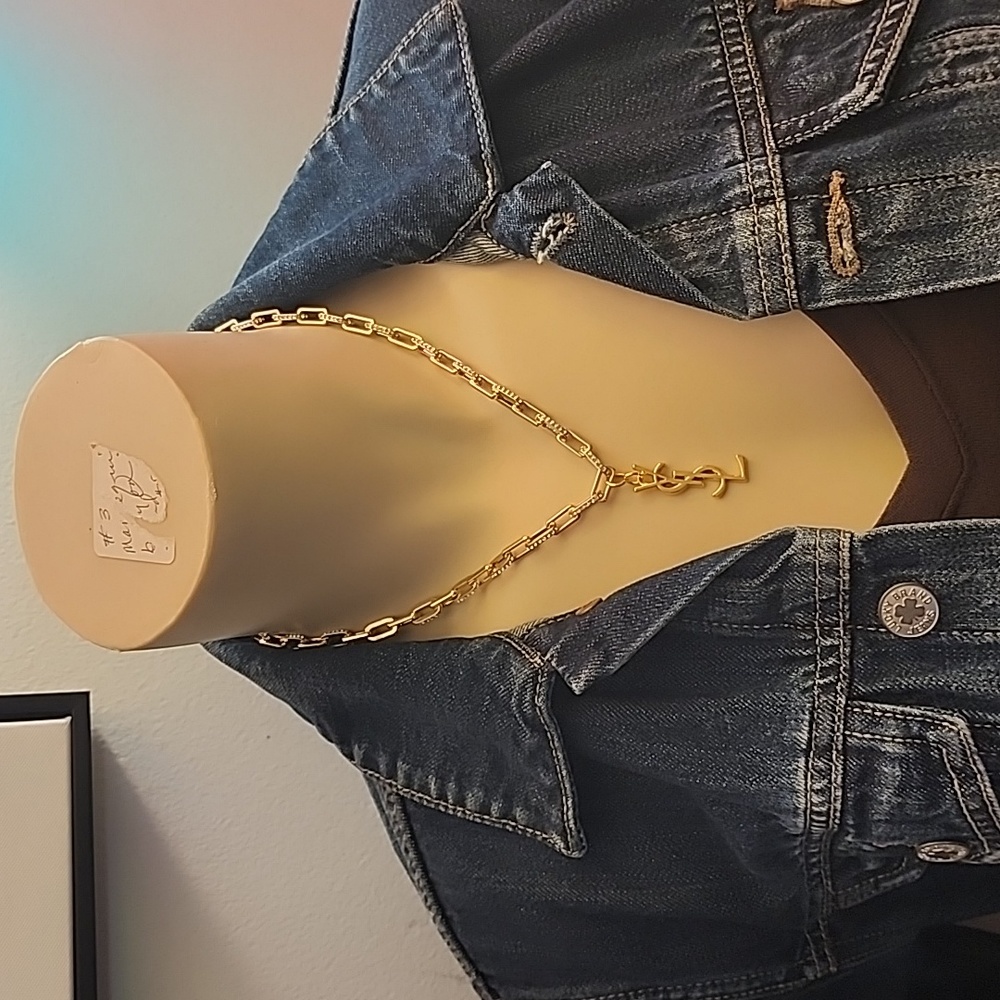 Authentic YSL charm on a chain